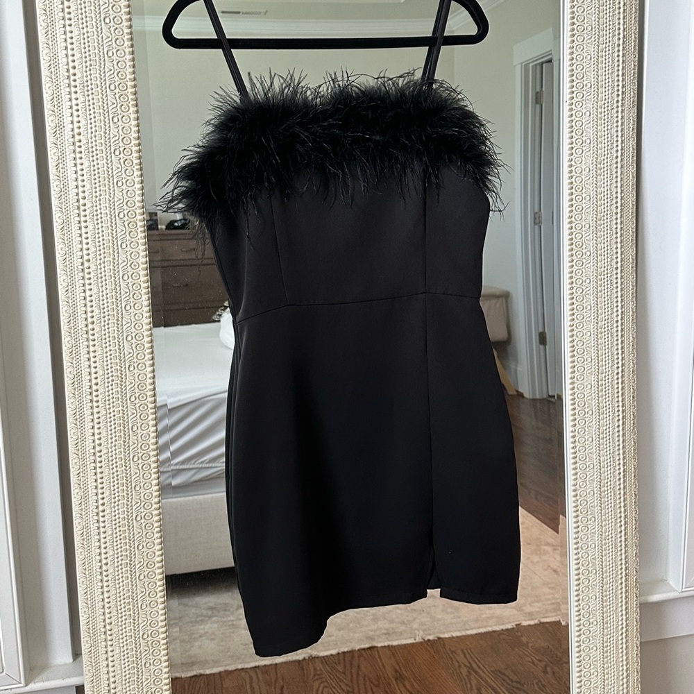 Mini black dress w/ feathered top